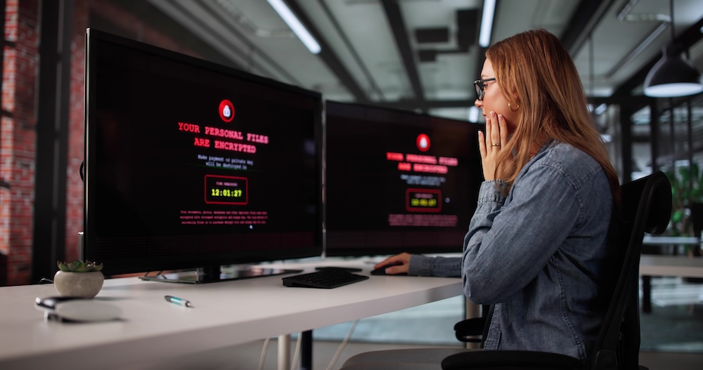 Female Businesswoman Prevents Cyber Security Breach With Encryption